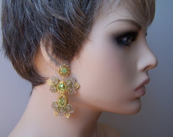 Long dangle drop earrings with Swarovski elements . Green gold luxurious bridal earrings.