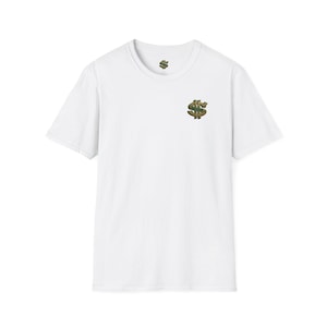 May include: A white short-sleeve crew neck t-shirt featuring a small embroidered dollar sign logo on the left chest. The logo is rendered in shades of green and brown. A matching small dollar sign logo is printed on the inside neck label area.