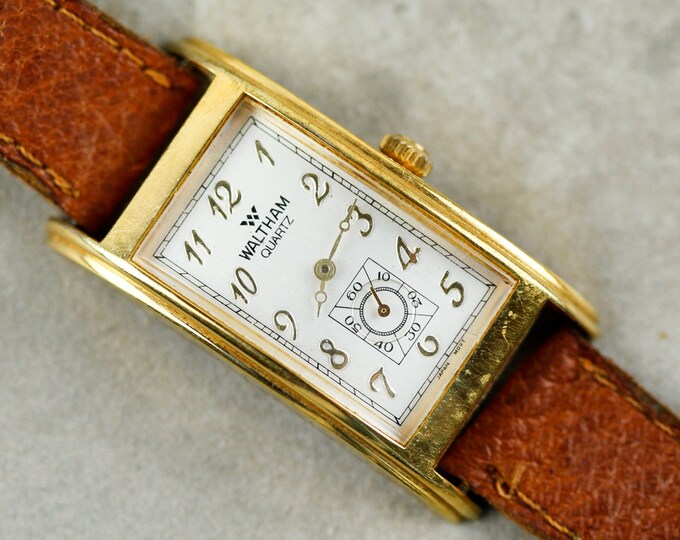 Vintage Waltham Quartz Watch With Curved Case and Brown Leather Strap