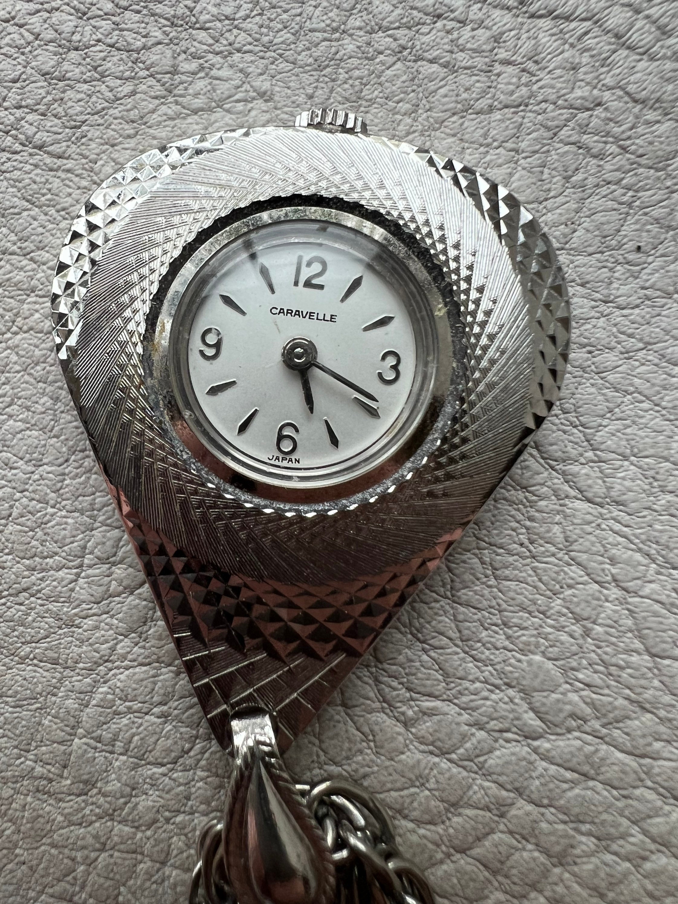 Caravelle store pendant watch