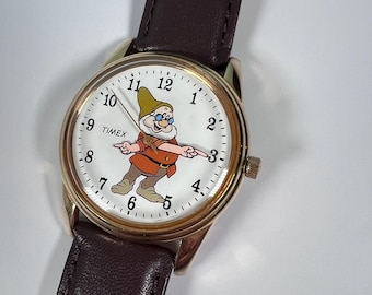 Montre Timex vintage Disney Blanche-Neige, Sept nains avec Doc - La montre fonctionne !