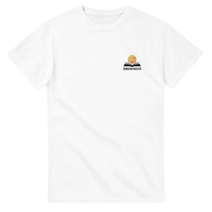 May include: White t-shirt featuring a small graphic of a gold twenty-sided die and an open book. The text "DUNGEON MASTER" is printed below the graphic in black. The shirt is made of a soft material.