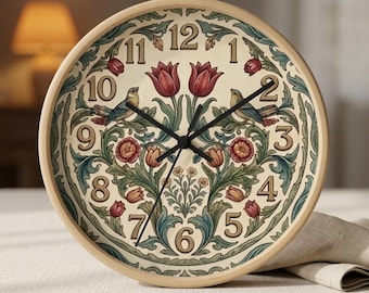 May include: A round wall clock with a light wood frame. The clock face features a floral design with red tulips, birds, and green leaves. Black clock hands point to the numbers around the clock face.