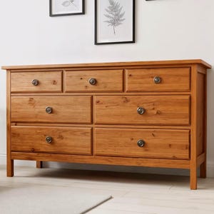 May include: A handmade wooden sign with the text "Welcome" in a handwritten style. The sign is painted white with a distressed finish and features a small, decorative heart. Perfect for a front door or entryway.