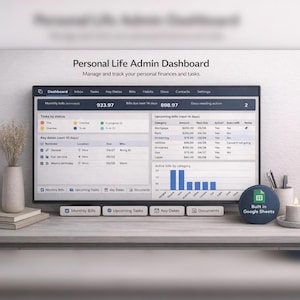 May include: A computer monitor displaying a personal life admin dashboard. The screen shows financial data, including monthly bills, upcoming tasks, and key dates. The text "Personal Life Admin Dashboard" is visible at the top. The dashboard is built in Google Sheets.
