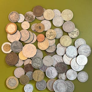 May include: A rustic wooden sign with the text "Welcome to our home" in white lettering. The sign features a distressed finish and a simple, inviting design, perfect for entryway decor.