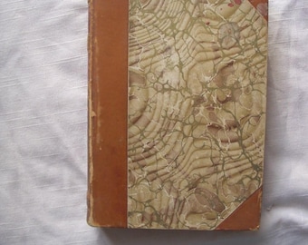 Antique  Lucile By Owen Meredith book  late 1800s or very  early 1900s. Marbled leather hardcover.