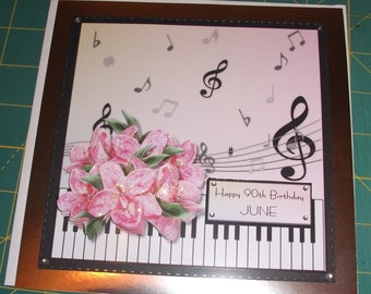 Music lover birthday card with piano keys , musical notes and pretty pink flowers. Music themed birthday card