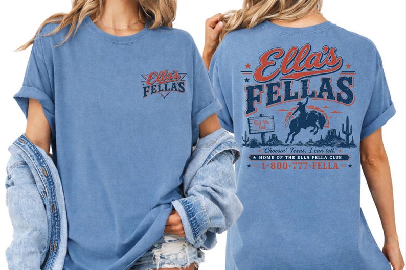 A woman wearing a blue t-shirt with the text "Ellas Fellas" printed on it, along with a graphic of a cowboy on a horse.