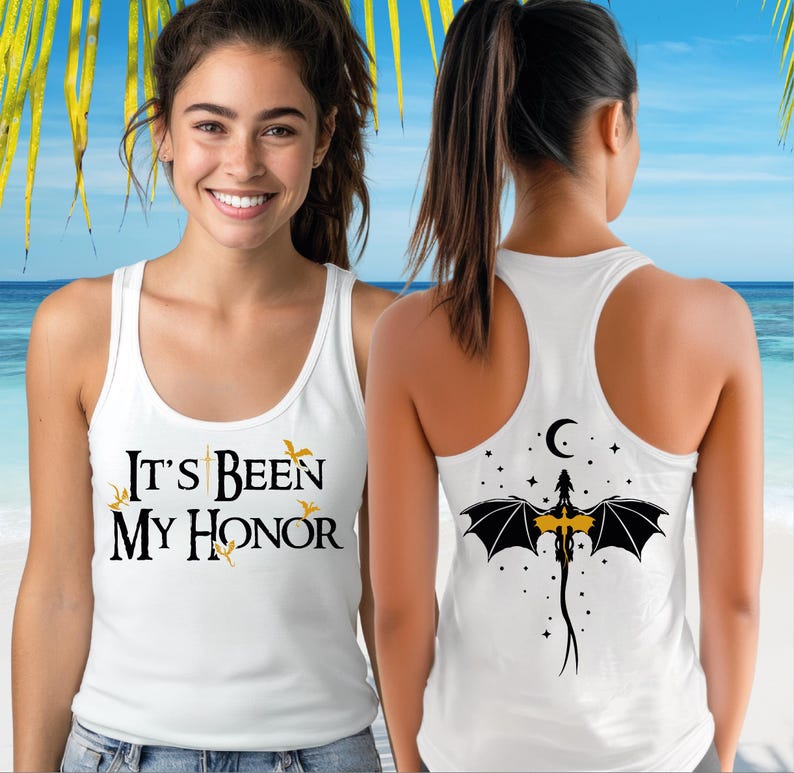 A smiling woman wearing a white tank top with text and a graphic design on the back.