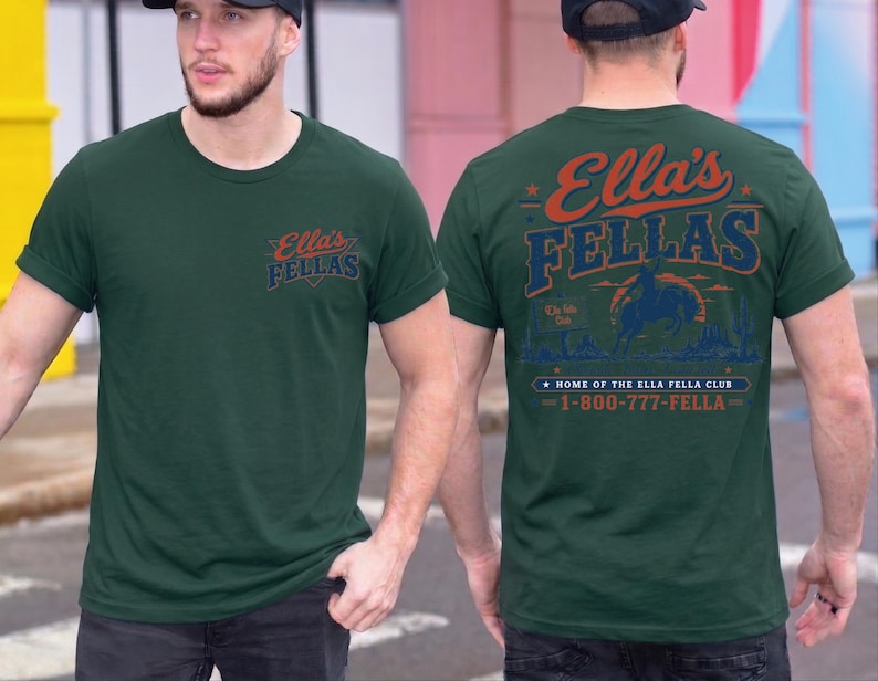 A man wearing a green t-shirt with text and graphics on the back.