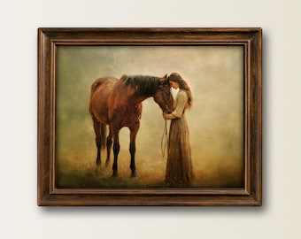 May include: A framed wall art print depicting a person in a long dress standing beside a brown horse in a misty field. The person holds a thin lead rope and rests their forehead against the horse's head. The frame is dark brown wood.