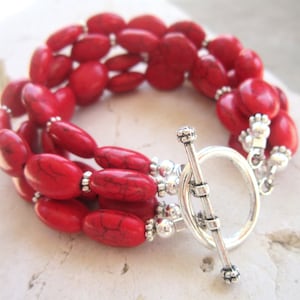 Red Beadwork Turquoise Bracelet. Red Howlite Multi Strand Bracelet. Red Semi Precious Stone Bracelet. Red Toggle Bracelet. Red Jewelry