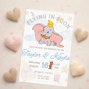 May include: A baby shower invitation featuring Dumbo the elephant with the text "FLYING IN SOON". The invitation includes the names "Taylor & Kayla", date, time, and address. The design incorporates pastel colors and star accents.