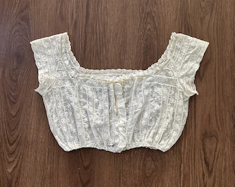 Antik spetskorsettöverdrag. Vintage spetstopp. Storlek XS till Small