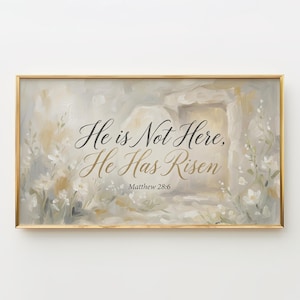 May include: A framed artwork with a gold border. The painting features a soft, neutral color palette with the words "He is Not Here, He Has Risen" in elegant script. The text is accompanied by the Bible verse Matthew 28:6.