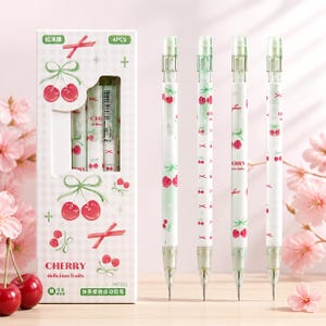 May include: A set of four mechanical pencils with a white barrel featuring a red cherry and green ribbon pattern. The packaging is a white box with a checkered design, cherry illustrations, and the text CHERRY delicious fruits 0.5 mm.