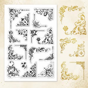May include: A sheet of decorative corner designs in black and gold. The black designs feature floral and scroll patterns. The gold designs have a glittery appearance. These embellishments are suitable for scrapbooking, card making, and other paper crafts.