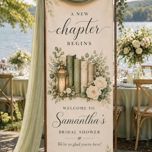 May include: A vertical rectangular banner on a copper stand featuring the text A NEW CHAPTER BEGINS, WELCOME TO Samantha's BRIDAL SHOWER, and We're so glad you're here. The design includes a lantern, stacked books, white roses, and eucalyptus leaves.