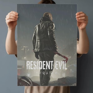 May include: A poster featuring artwork from "Resident Evil: Requiem." The image shows a figure in a leather jacket holding a weapon, set against a rainy cityscape. The game's title is prominently displayed.
