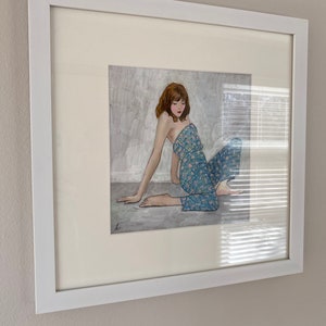 Joyful Jumpsuit, gouache painting of woman in a blue printed jumpsuit, under archival mat in white frame, ready to hang, inspired by Schiele image 7