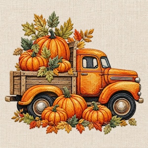 May include: An embroidered illustration of an orange vintage pickup truck carrying a load of orange pumpkins and green, yellow, and red autumn leaves. Additional pumpkins and fall foliage are arranged around the base of the truck.
