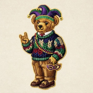 May include: Embroidered teddy bear wearing a jester hat, a colorful sweater, and brown pants. The bear is holding a purple mask and making a hand gesture. The bear is wearing brown loafers and a beaded necklace.
