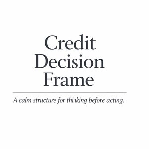 May include: White background with the text "Credit Decision Frame" in a dark, elegant font. Below, the text reads "A calm structure for thinking before acting."