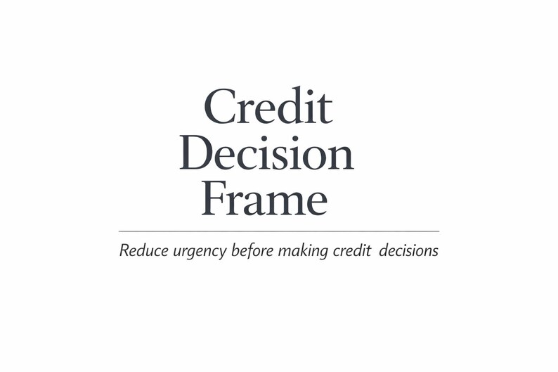 May include: A white background with the text "Credit Decision Frame" in a dark, serif font. Below, smaller text reads "Reduce urgency before making credit decisions."