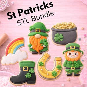 May include: A selection of St Patrick's Day cookies, featuring a rainbow, gnome, pot of gold, horseshoe, leprechaun, and a black boot with a green top. The cookies are decorated with green shamrocks and gold accents. Text reads "St Patricks STL Bundle."
