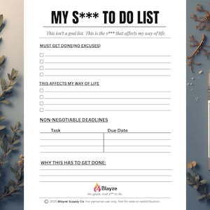 May include: A white to-do list titled "MY S*** TO DO LIST" with sections for tasks and deadlines. Includes a pencil, pen, and sprigs of greenery. The text reads "This isn't a goal list. This is the s*** that affects my way of life."