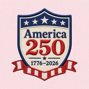 May include: Embroidered shield-shaped patch with a blue border and stars at the top. The text "America 250" is in the center, with "1776-2026" below. A red, white, and blue ribbon is at the bottom.
