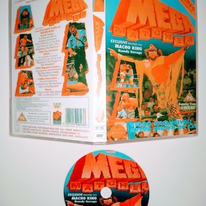 May include: A DVD case and disc for "Mega Matches" featuring "Macho King" Randy Savage. The case is blue and orange with images of wrestlers. The disc has the same design. The case reads "Exclusive Profile on Macho King Randy Savage."
