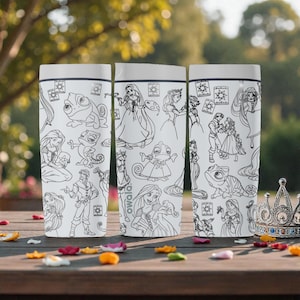 May include: Three white insulated tumblers with black line art of Disney princesses and characters. The tumblers are decorated with images of Rapunzel, Cinderella, and other princesses. The tumblers are cylindrical and have a white lid.