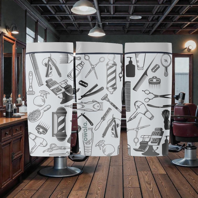 May include: A white barber shop privacy screen featuring a repeating pattern of barber tools, including scissors, razors, combs, and barber poles. The screen is divided into three panels and stands in a barber shop setting.
