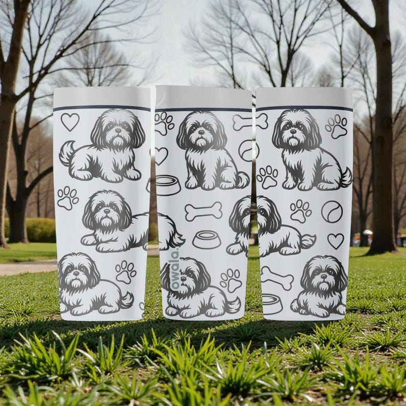 May include: Three white tumblers with a Shih Tzu dog design. The design includes paw prints, hearts, dog bowls, and bones. The dog is depicted in various poses. The tumblers are cylindrical and appear to be made of a durable material.