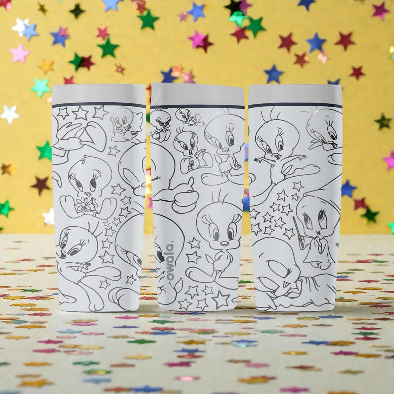 May include: Three white water bottles with a black and white cartoon design featuring Tweety Bird and star shapes. The bottles have a white lid and the brand name "owala" is visible on one of the bottles.
