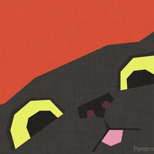 May include: A graphic illustration of a dark gray cat head with large yellow eyes, a small pink tongue, and dark purple inner ears set against a solid orange background. The text "Patterns by LittleTinyPiranha" is visible in the bottom right corner.