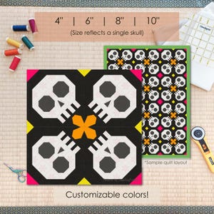 May include: A black and white skull quilt block with customizable colours. The image shows a sample quilt layout with a green border. Sizes are available in 10.16 cm, 15.24 cm, 20.32 cm, and 25.4 cm (4", 6", 8", and 10").
