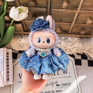 labubu dressed in designer Where do you get the designer outfits? : r/labubu