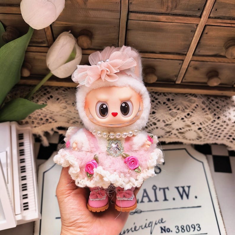 Pink crochet princess outfit displayed on 17cm figure