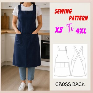 May include: A navy blue apron with two front pockets and wide shoulder straps, worn over a white t-shirt and blue jeans. The image includes text reading SEWING PATTERN XS To 4XL and CROSS BACK, alongside a black and white line drawing of the apron.