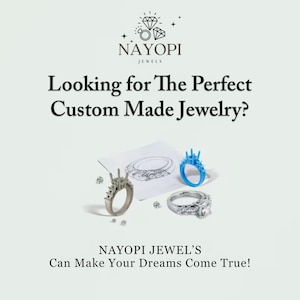 Minimalist gold diamond cluster pendant necklace with small round stones.