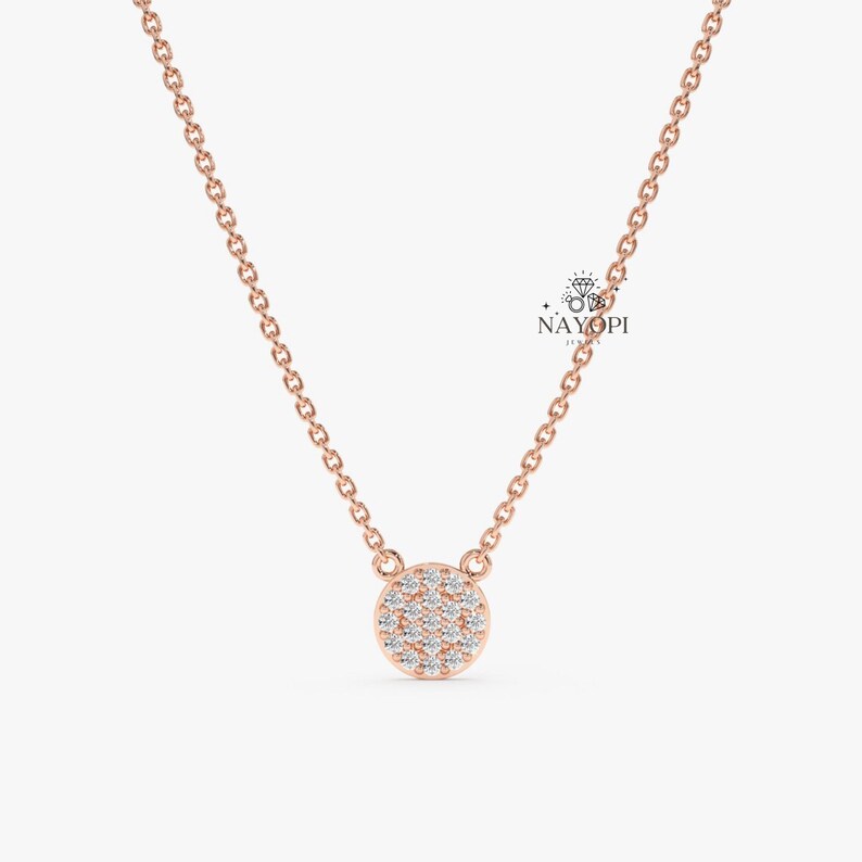 Minimal gold diamond disc pendant necklace for everyday wear.