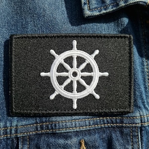 May include: A handmade wooden sign with the text "Welcome to our home" in a handwritten style. The sign is painted white with black lettering and a distressed finish, perfect for home decor.