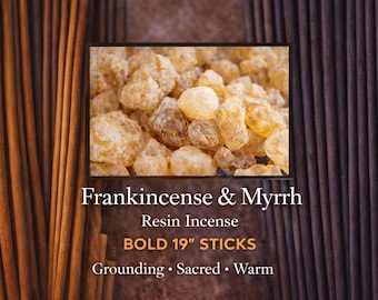 May include: The image features frankincense and myrrh resin incense. The text reads "BOLD 19" STICKS". The background includes vertical brown incense sticks and a dark brown textured surface. The image also includes the words "Grounding, Sacred, Warm".