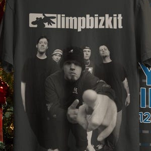 May include: A set of three ceramic mugs with a speckled, matte finish. The mugs are in shades of cream, light gray, and dark gray. Each mug has a simple, minimalist design and a rounded handle.