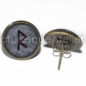 May include: A pair of bronze stud earrings featuring a red rune symbol on a grey background. The rune is the Algiz rune, which symbolises protection and guidance.