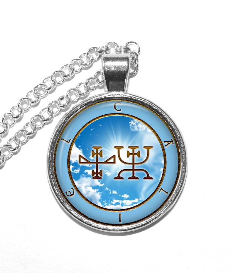 May include: Silver necklace with a round pendant featuring a blue sky with white clouds and a gold sigil. The sigil is surrounded by a circle with the letters "CLAIEL" inscribed around it.