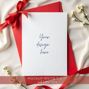 May include: A mockup invite with a white card and red envelope, tied with a red satin ribbon. The card has the text "Your design here" in elegant script. The invite is 5 x 7 inches.